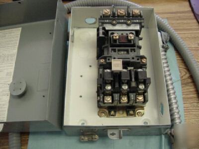 Allen-bradley 509-A0D in breaker box w/conduits <